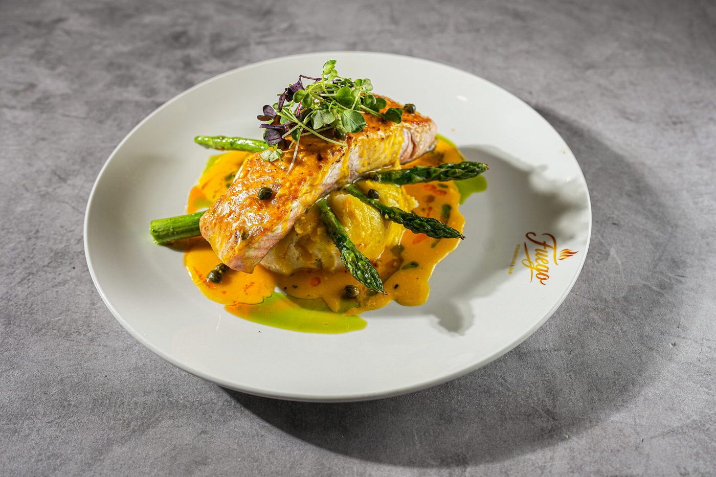 Pan-seared salmon plated with a citrus glaze